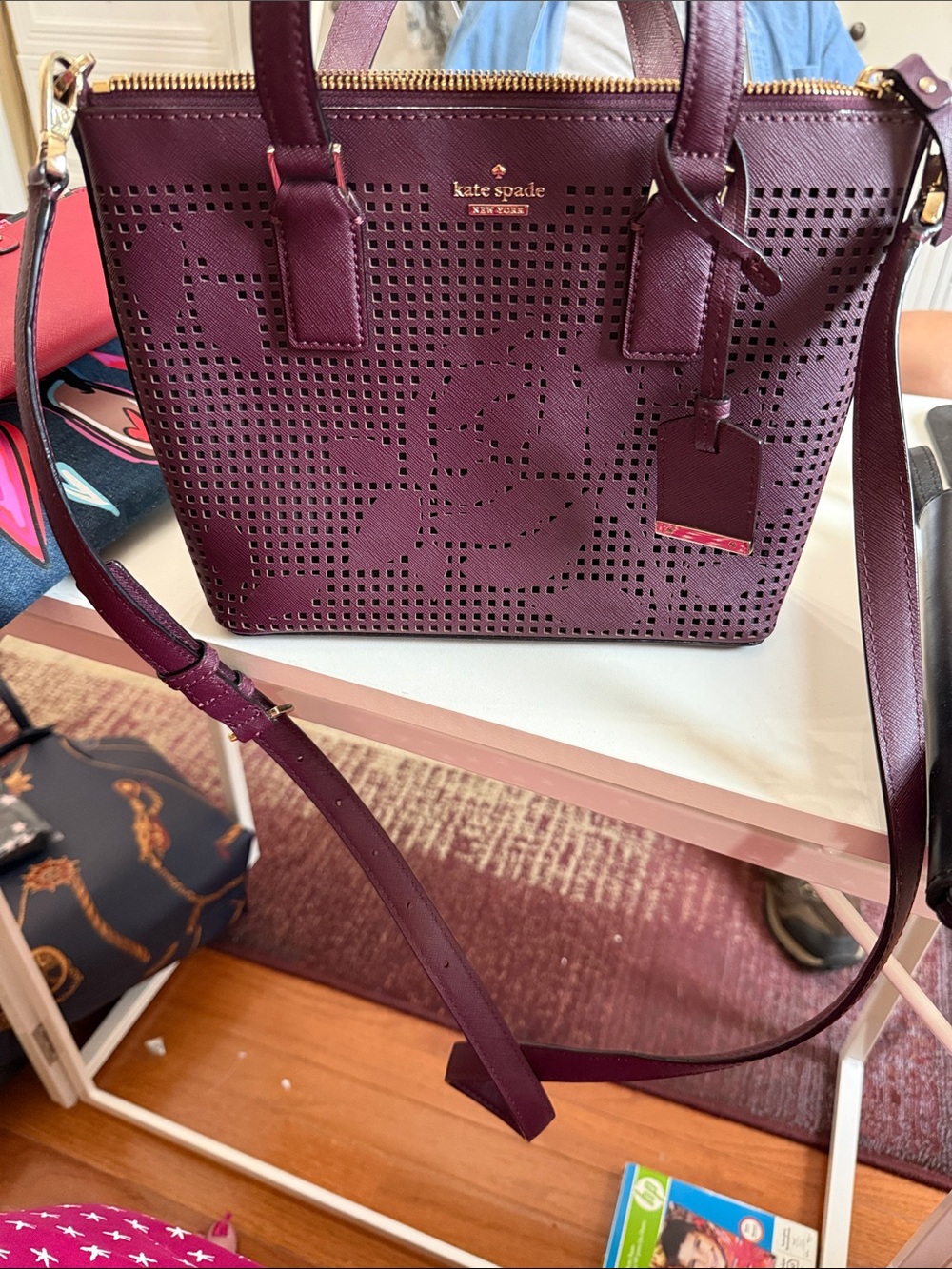 Kate Spade perforated rose wine crossbody. 8x 10”. Never used. Burgandy rose - Picture 8 of 9